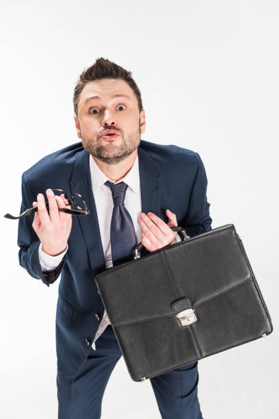 istock chubby businessman in formal wear gesturing and looking at camera isolated on white 1150910076