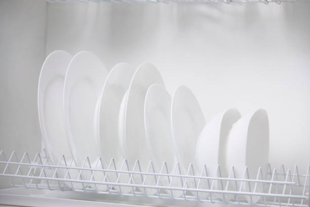 istock White plates in the closet 1150910428