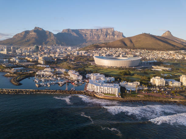 Aerial view of Cape Town, South Africa with Table Mountain Aerial view over Cape Town, South Africa with Table Mountain lions head mountain stock pictures, royalty-free photos & images