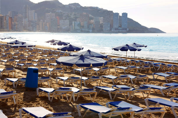 istock Benidorm sunrise with hammocks and parasol 1150918043