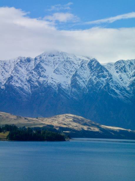 istock Snowy mountains and a blue lake 1150918482