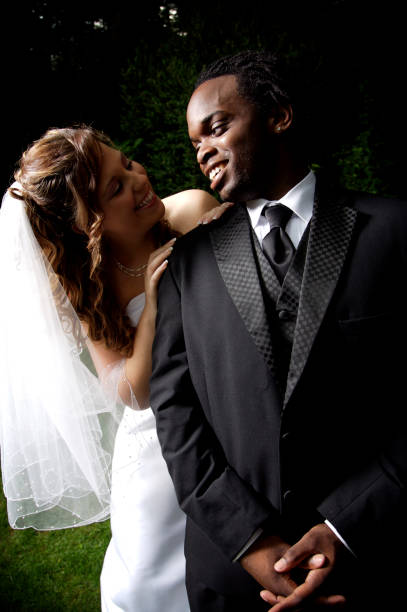 istock young couple wedding portraits 115092105