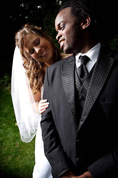istock young couple wedding portraits 115092107