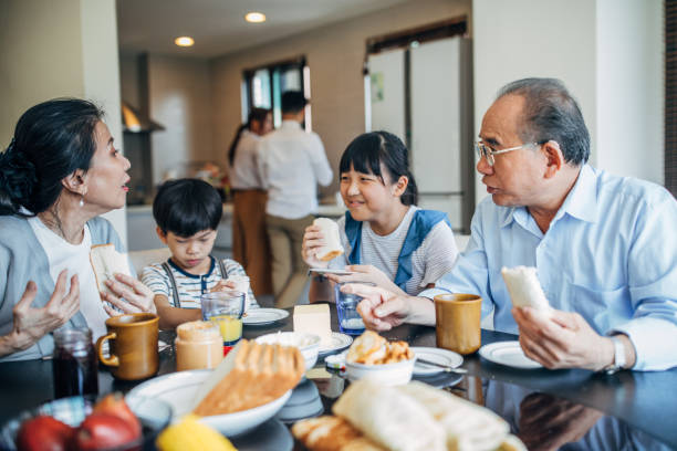 istock Family having meal together 1150923054