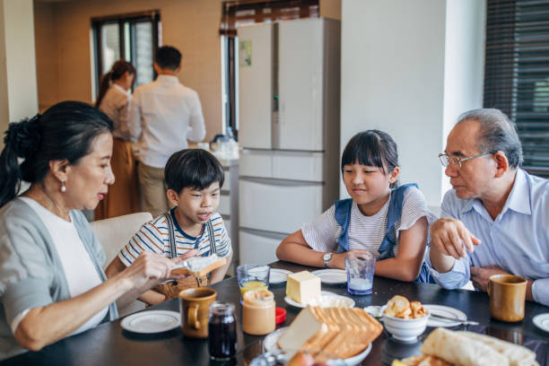 istock Family having meal together 1150923091