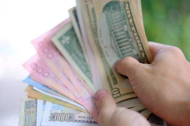 istock Hands hold a money and business finance copy space 1150925883