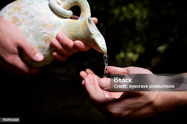 Water Poured Out Humanitarian Stock Photo - Download Image Now - Altruism, Anointing, Assistance