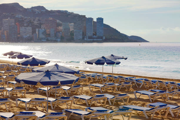 istock Benidorm sunrise with hammocks and parasol 1150928243
