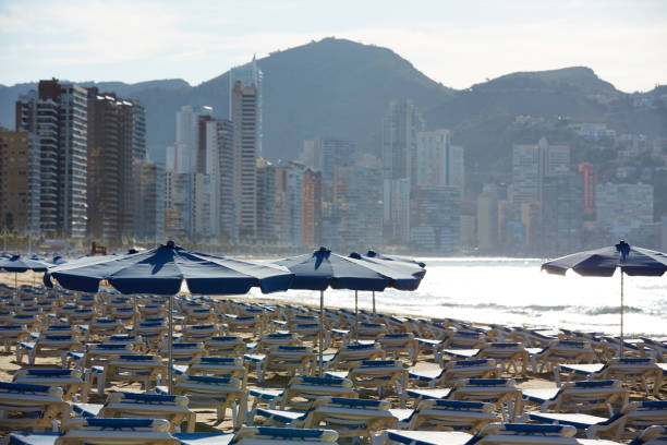 istock Benidorm sunrise with hammocks and parasol 1150928397