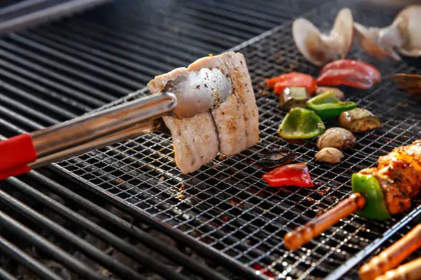 Photo of Grilled fish steak and vegetables