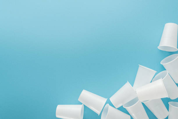 istock top view of white plastic cups on blue background with copy space 1150933701