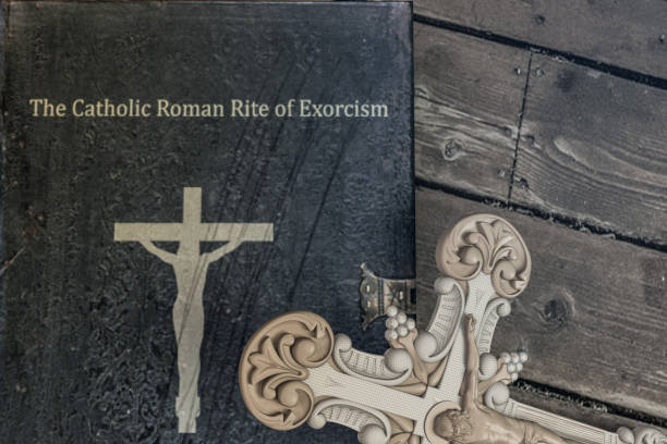 istock exorcism book on wooden floor 1150934934
