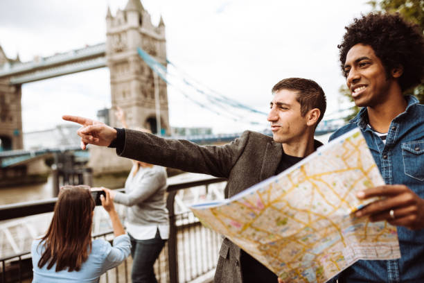 istock tourist in london at tower bridge 1150934947