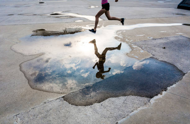 istock Woman Running on Asphalt 1150934953