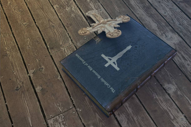 istock exorcism book on wooden floor 1150934960