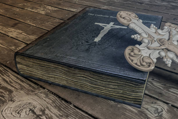 istock exorcism book on wooden floor 1150935035