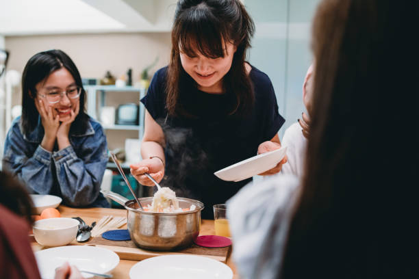 istock Women dinner party at home 1150936822