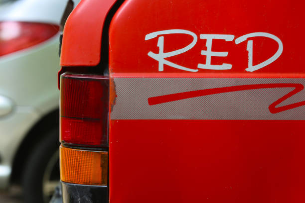 istock an old red car with an inscription on the side. 1150937568