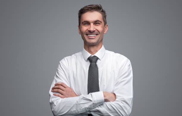 istock Confident businessman cheerfully smiling 1150944414