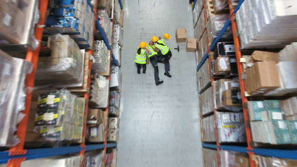istock Dangerous accident during work. Warehouse aerial view 1150944725