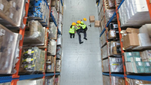 istock Dangerous accident during work. Warehouse aerial view 1150944773