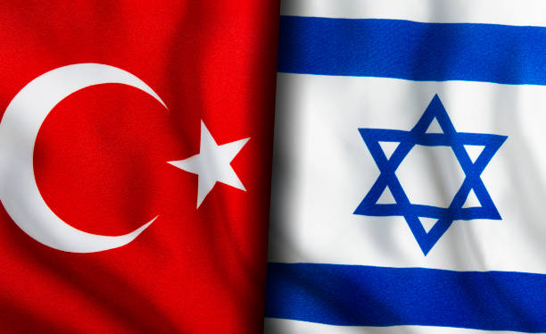 istock Turkish and Israeli flags standing side by side 1150945092