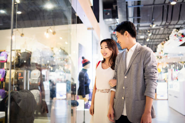 istock Young couple in a shopping mall 1150946608