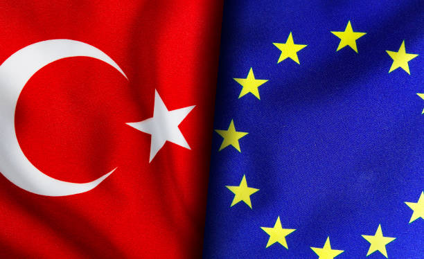 istock Turkish and European Union flags standing side by side 1150946621