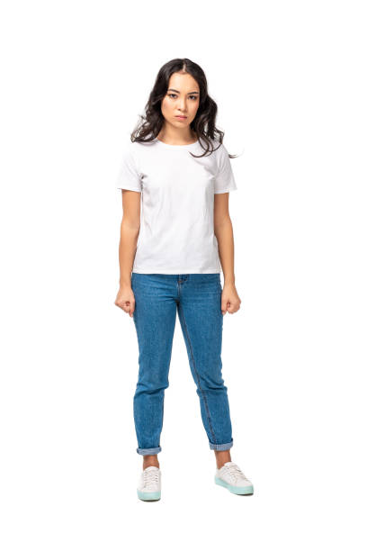 istock dissatisfied young asian woman standing with hands down isolated on white 1150953300