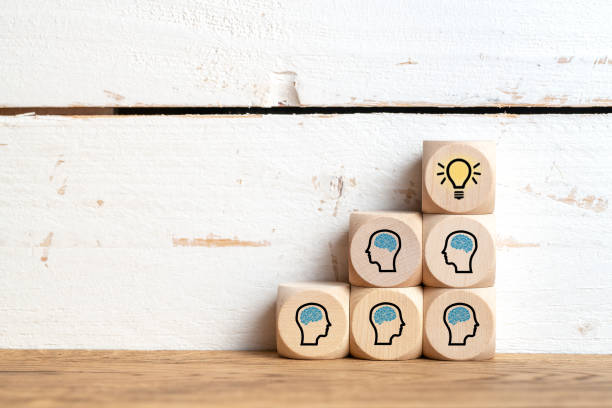 istock many people together having an idea symbolized by icons on cubes 1150953400