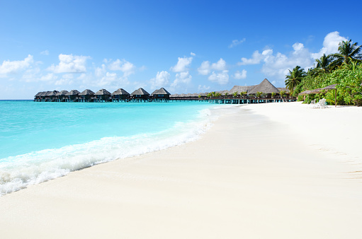 Holiday villas in lagoon,Tropical paradise beach resort of Maldives.