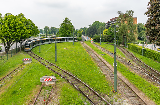 Brussels, Belgium - May 19 2019: A tram travels around an end of line loop to return to city of Brussels