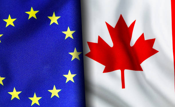 istock European union and Canadian flags standing side by side 1150956511