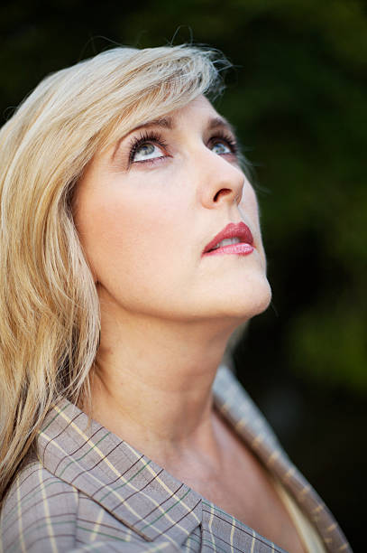 istock middle aged blonde portraits 115095751