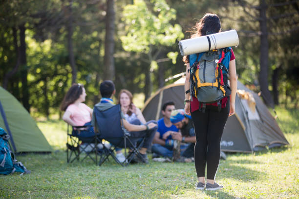 istock Friends camping in the forest together 1150958348