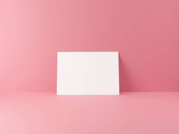 istock Blank Flyer Sign Pink Background Shadow 1150958602