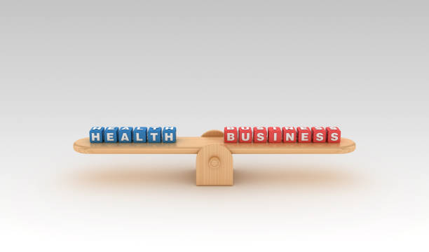 istock Seesaw with HEALTH BUSINES Buzzword Cubes - 3D Rendering 1150959873