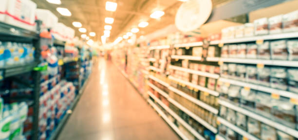 istock Panoramic view blurry background coffee and tea selection at American grocery store 1150960253