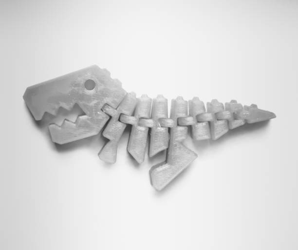 Bright light pink object in shape of dinosaur toy printed on 3d printer