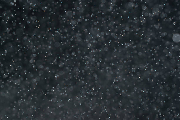 istock abstract splashes of water on a black background 1150964633