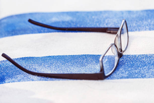 istock Glasses on beach mattress 1150971537