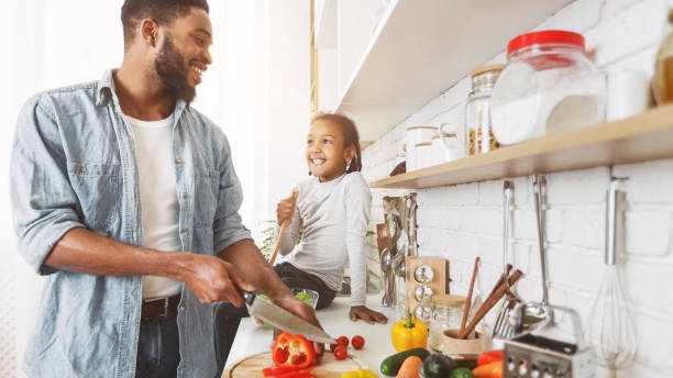 istock Happy family cooking concept 1150972981