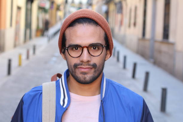 istock Mixed race person with blank expression outdoors 1150973173