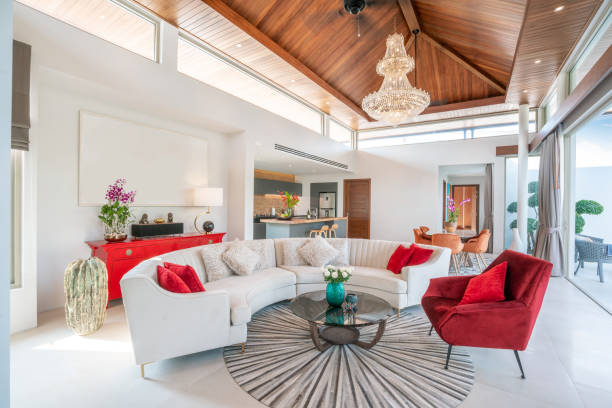 istock interior design in living room with high raised ceiling, sofa, middle table and chair 1150973544