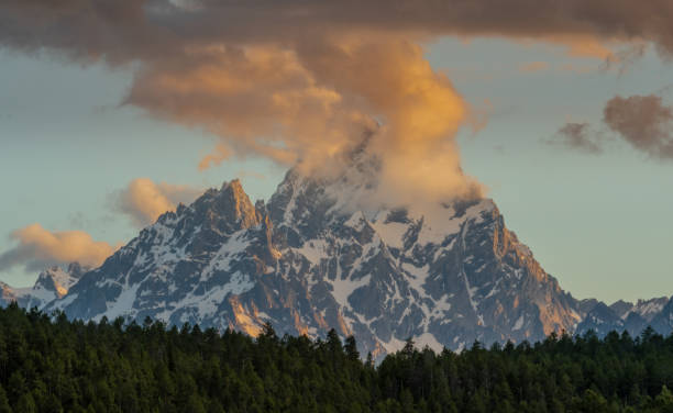 istock Cloud Hovers in front of Grand Teton 1150973655