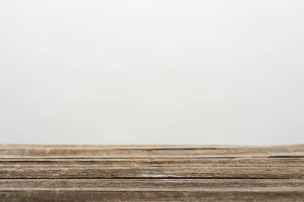 istock brown desk surface with wooden texture 1150974898