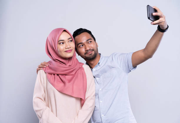 istock Asian Malay Couple taking a selfie together. 1150976130