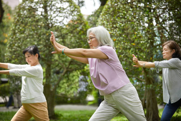 istock Trainer giving martial arts training at park 1150977980