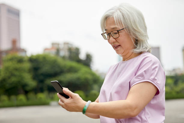 istock Female tourist is texting on smart phone 1150978013