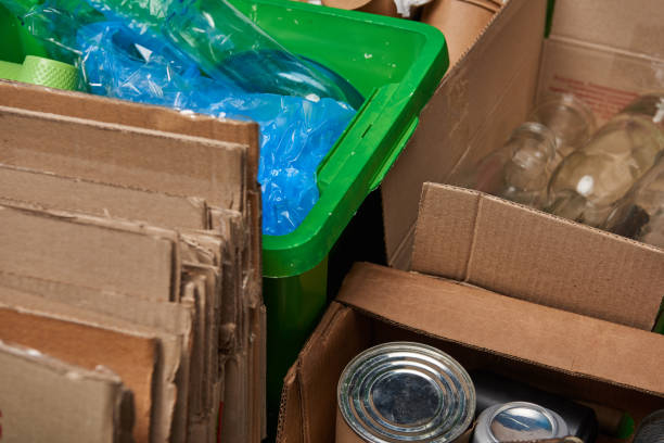 istock sorted trash of cardboard, glass and plastic bottles, polyethylene, iron cans 1150978154